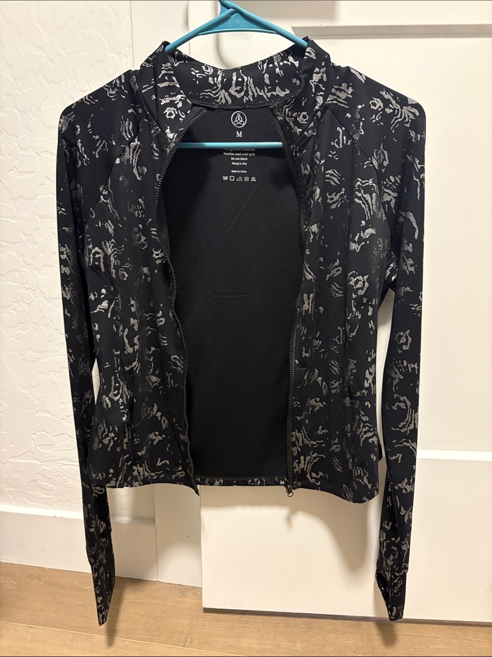 Black Zip-Up Jacket with Subtle Silver Abstract Print